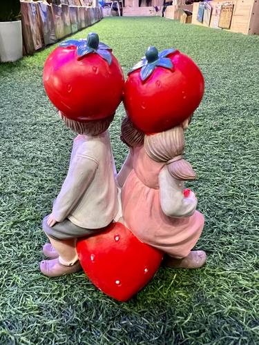 זוג בובות פרות וירקות