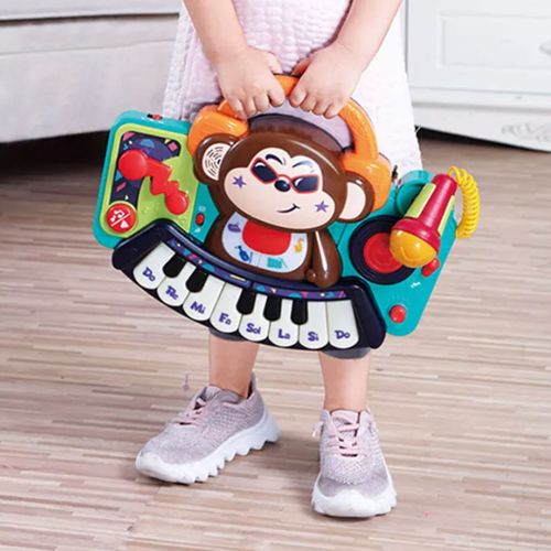 עמדת די ג'יי קוף עם פסנתר לימודי, מיקרופון הקלטת מוזיקה ושמיעת שירים