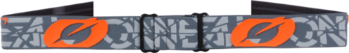משקפי אבק ONEAL B-20 GOGGLE STRAIN בצבע אפור עם עדשה כתומה, כוללים עדשה יצוקה תלת מימדית, קצף תלת שכבתי, רצועה עם פסי סיליקון וציפוי נגד שריטות למקסימום הגנה ונוחות ברכיבה