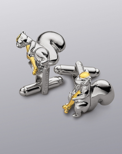 חפתים Silver and gold squirrel playing golf