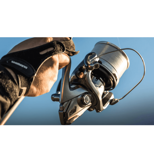 רולר דייג שימאנו אולטגרה Shimano Ultegra 14000 XSE כסוף יוקרתי לדייג חופים וקרפיונים תמונה של זריקה
