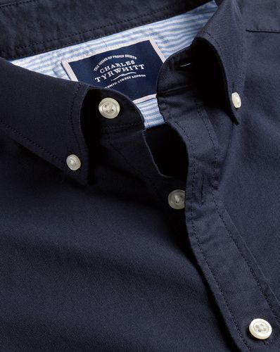 חולצת אוקספורד גזרת אקסטרה סלים - Navy blue plain extra slim fit button-down washed Oxford shirt