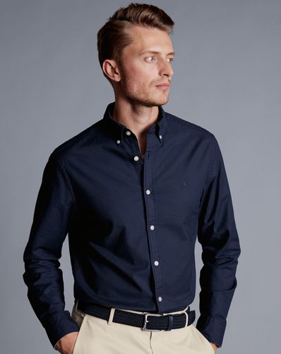 חולצת אוקספורד גזרת אקסטרה סלים - Navy blue plain extra slim fit button-down washed Oxford shirt