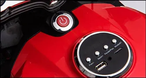 אופנוע ממונע 12V דמוי דוקאטי, נסיעה קדימה ואחורה ואורות בגלגלים - לבן