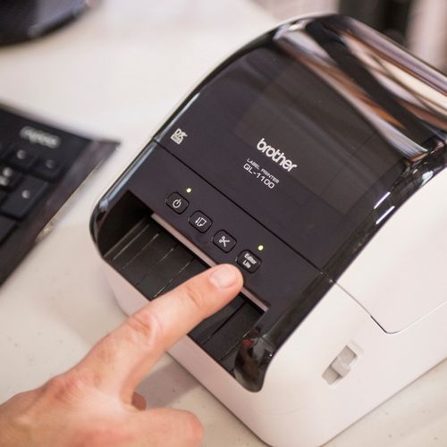 מדפסת מדבקות תוויות שילוח וברקוד Brother QL-1100 PC ברדר