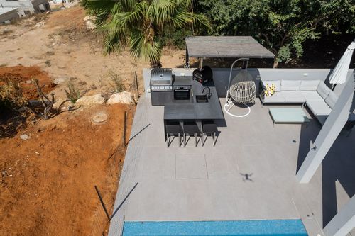 מטבח אי פינתי Giardino - מפגש מושלם של יוקרה, עוצמה ופונקציונליות לחוויית בישול חוץ יוצאת דופן