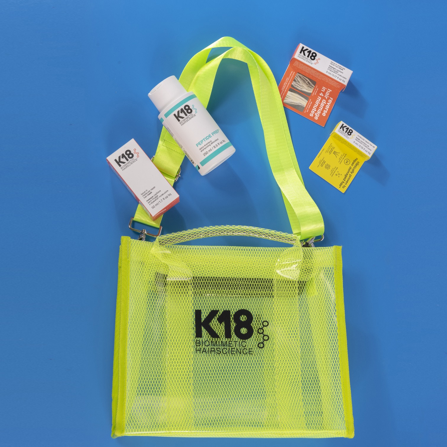 תיק K18 מכיל מסכה לתיקון 50ML + שמפו דיטוקס 250ML + מתנות ותיק אופנתי