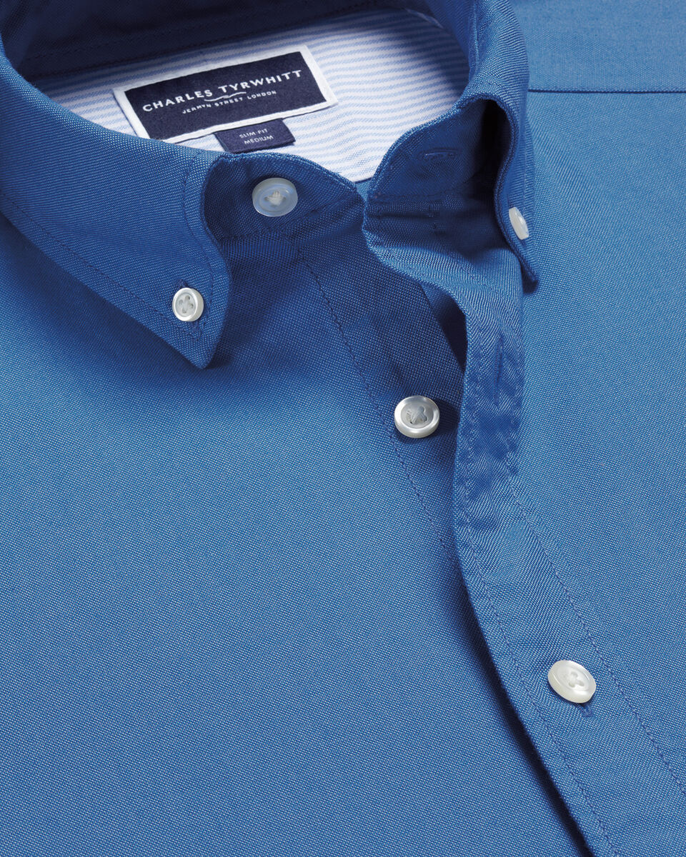 חולצה כחולה גזרת אקסטרה סלים -  Ocean blue button-down stretch washed Oxford extra slim fit shirt
