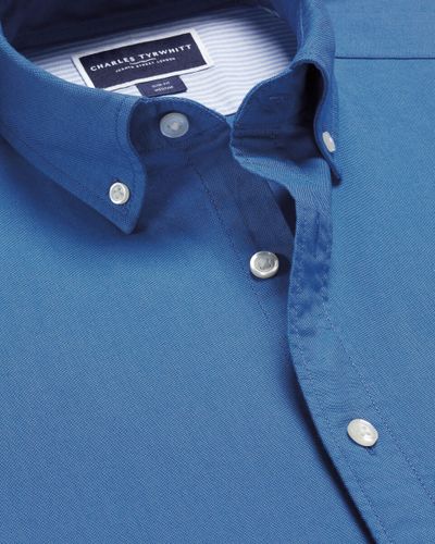 חולצה כחולה גזרת אקסטרה סלים -  Ocean blue button-down stretch washed Oxford extra slim fit shirt
