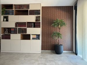 ספרייה עם שילוב עץ + חיפוי קיר