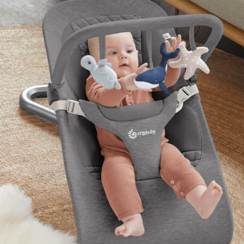 קשת צעצועים לטרמפולינת evolve מבית Ergobaby  – אפור כהה 