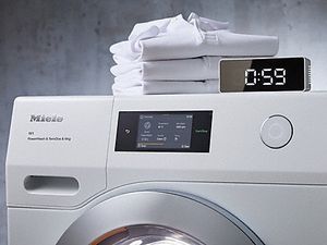 מכונת כביסה 9 ק"ג פתח חזית 1400 סל"ד Miele WEG 365 WCS מילה