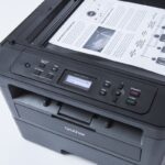 ‎DCP-L2510D ברדר