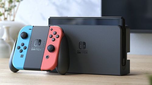 Nintendo Switch OLED NEON Mario Kart 8 Deluxe Bundle נינטנדו