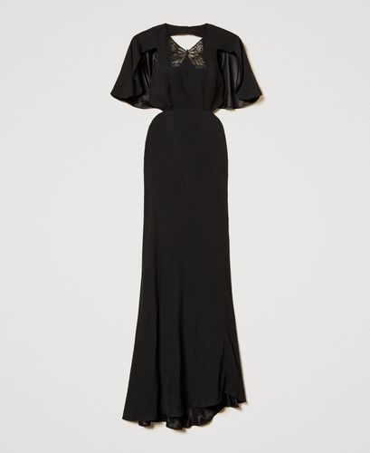 Long dress with cut-outs and an embroidered butterfly