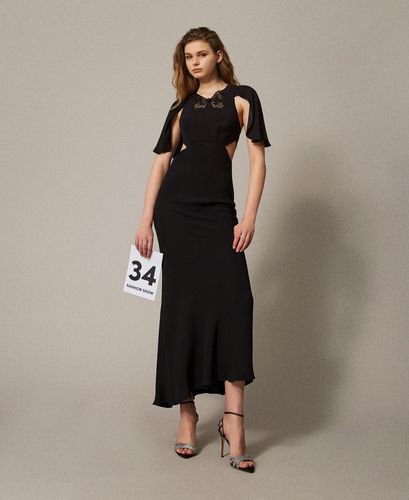 Long dress with cut-outs and an embroidered butterfly
