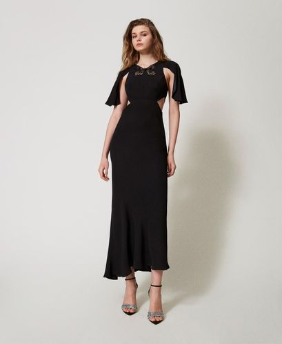 Long dress with cut-outs and an embroidered butterfly