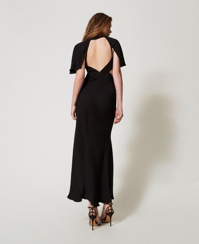 Long dress with cut-outs and an embroidered butterfly