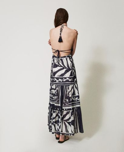 Long dress in muslin and crochet fabric