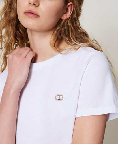T-shirt with a rhinestone Oval T logo White