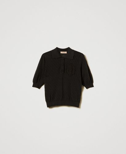 Knit polo shirt with embroidered patch