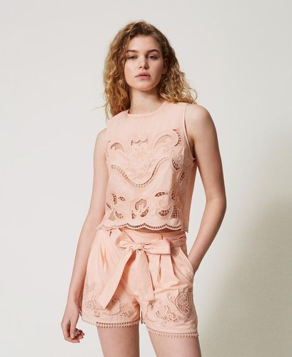 Top with openwork embroidery