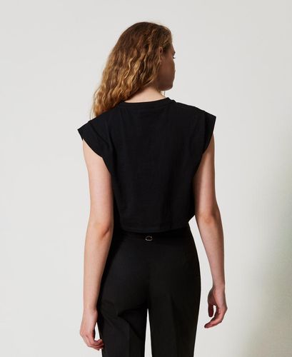 Cropped t-shirt with a rhinestone Oval T logo Black