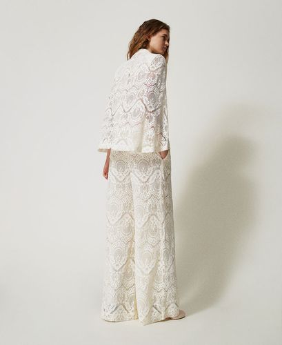 'Procida' palazzo trousers in macramé lace