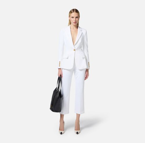 Crêpe cropped trousers with logo plaque Ivory