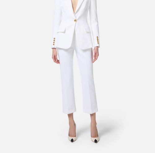 Crêpe cropped trousers with logo plaque Ivory