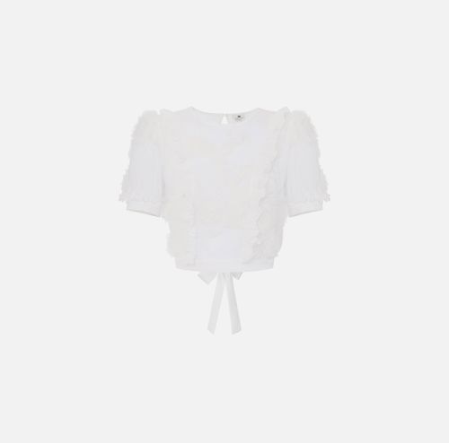 Top in georgette fabric embroidered with ruffles