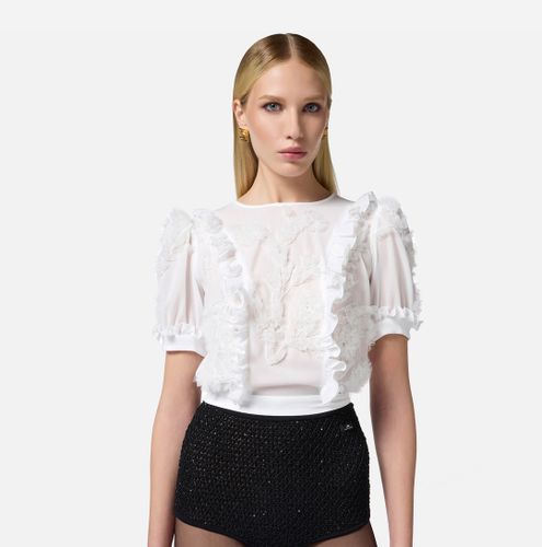 Top in georgette fabric embroidered with ruffles
