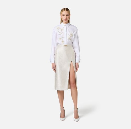 Cotton poplin shirt with floral embroideries