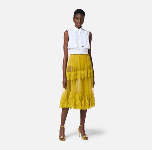 Skirt in tulle fabric with lace decorations