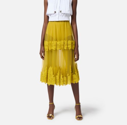 Skirt in tulle fabric with lace decorations