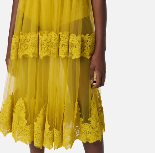Skirt in tulle fabric with lace decorations