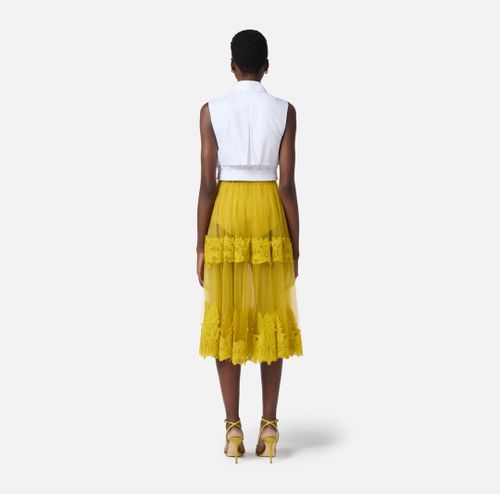 Skirt in tulle fabric with lace decorations