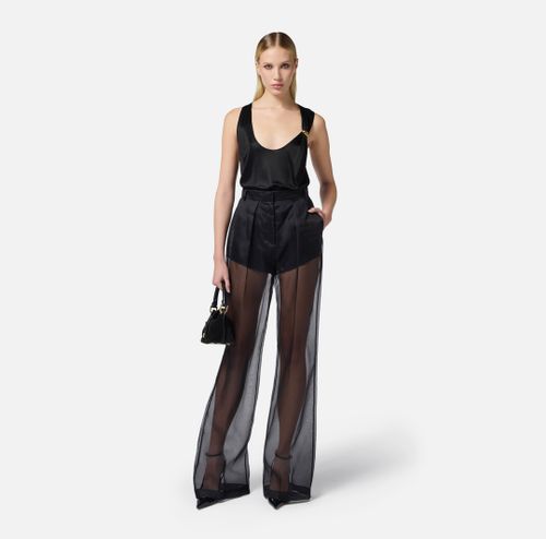 Trousers in organza and satin fabric