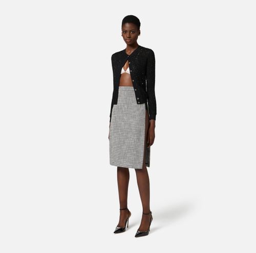 Skirt in diamond tweed fabric with panels