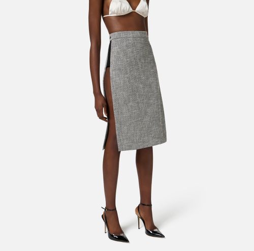 Skirt in diamond tweed fabric with panels