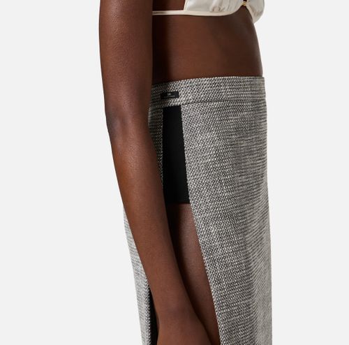 Skirt in diamond tweed fabric with panels