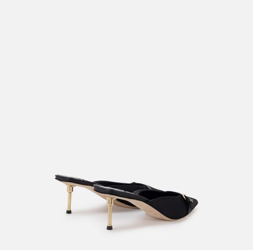 Mules with sculpture heel