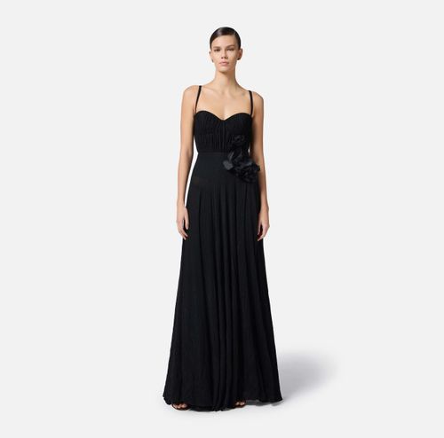 Red Carpet dress made of lurex jersey fabric with embroidered flower