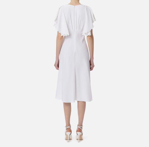 Dress in lightweight crêpe fabric with embroidered scallop