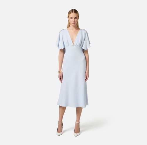 Dress in lightweight crêpe fabric with embroidered scallop