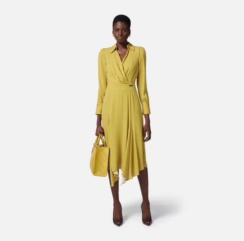 Dress in viscose fabric with polka dot print