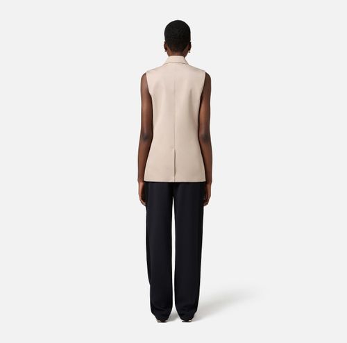 Cotton gabardine waistcoat with embroidered flower
