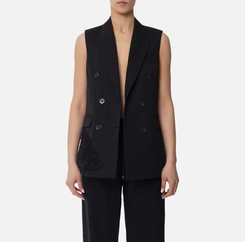 Cotton gabardine waistcoat with embroidered flower