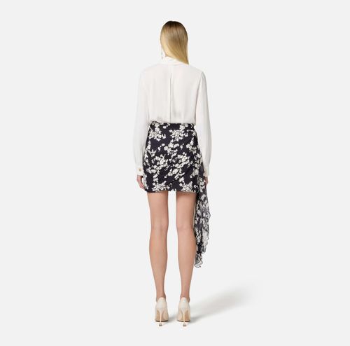 Skirt in printed georgette fabric with sash belt
