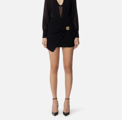 Flowing crêpe miniskirt with macro bow